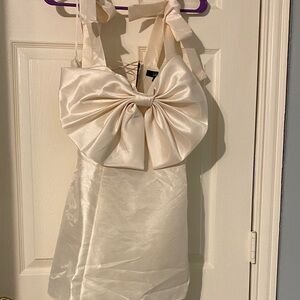 NWT Lulus Chic cream colored bow dress perfect for special occasions.
